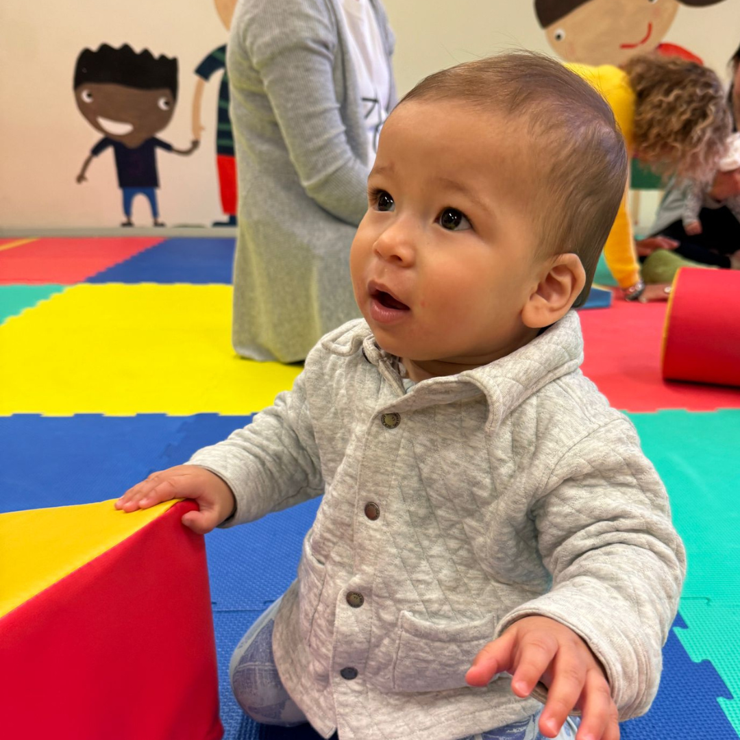 Baby playing with soft play