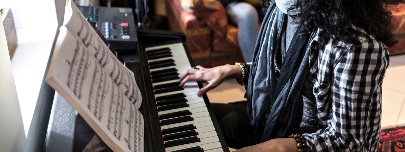 woman playing the piano