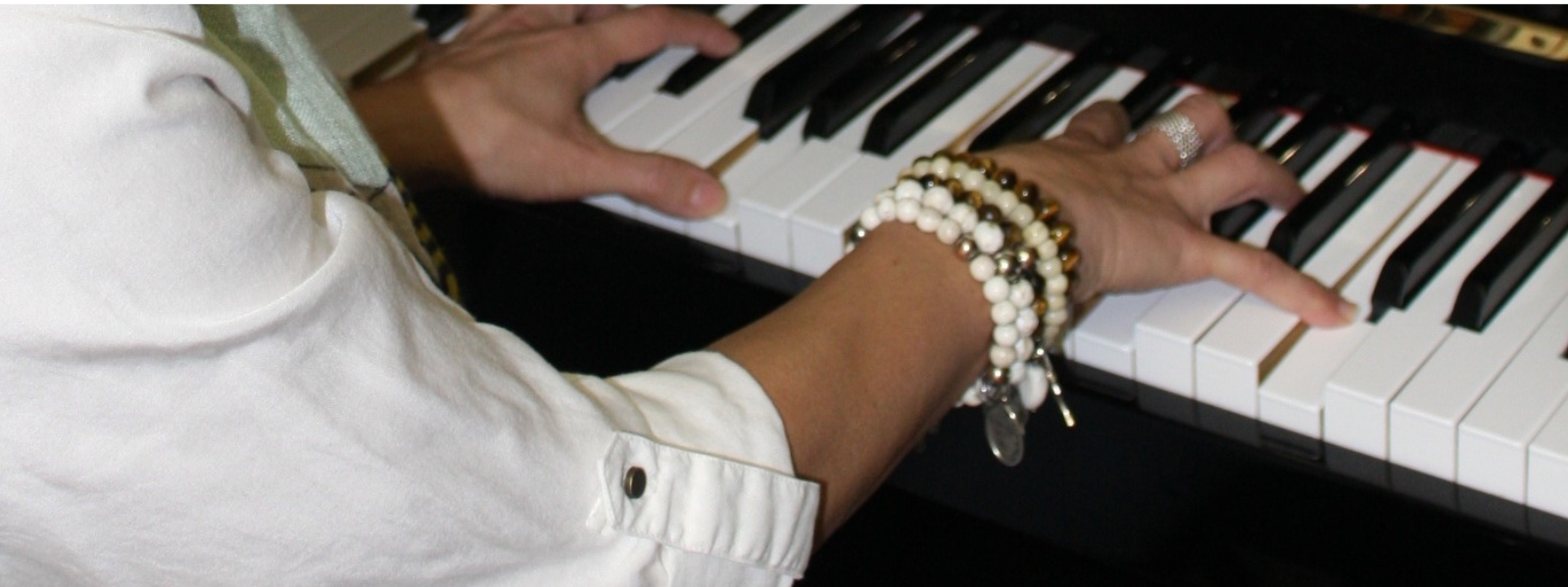 miss tania playing the piano