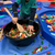 Big kid playing with pasta